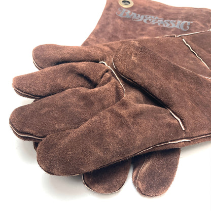 Close up of brown brushed leather gloves on a white background