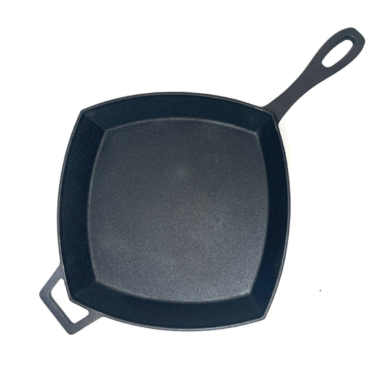 A 12-inch black cast iron square skillet with a handle, viewed from the top on a white background