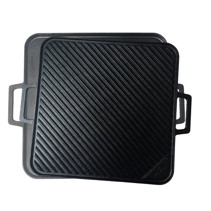 A 14-inch cast iron reversible square griddle with a flat surface and ribbed grilling surface on a white background.