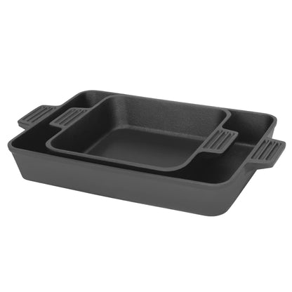 Set of two cast iron baking pans on a white background