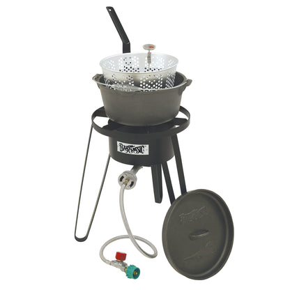 Tall black steel cooker with a cast iron pot, perforated basket, thermometer, and lid on a white background