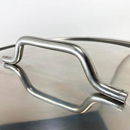 Close up of the lid handle on a Stainless Stockpot on white background