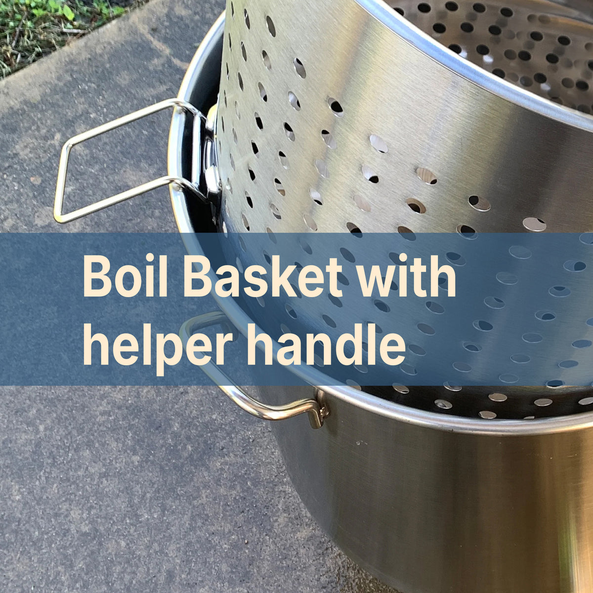 Stainless Basket Helper Handle resting on the side of a stockpot with text that reads boil basket with helper handle
