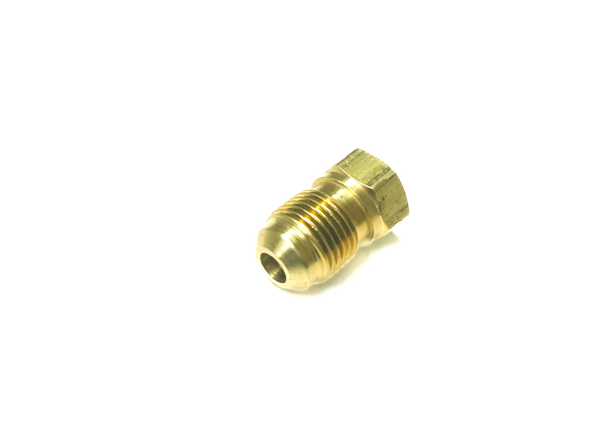 A brass fitting on a white background