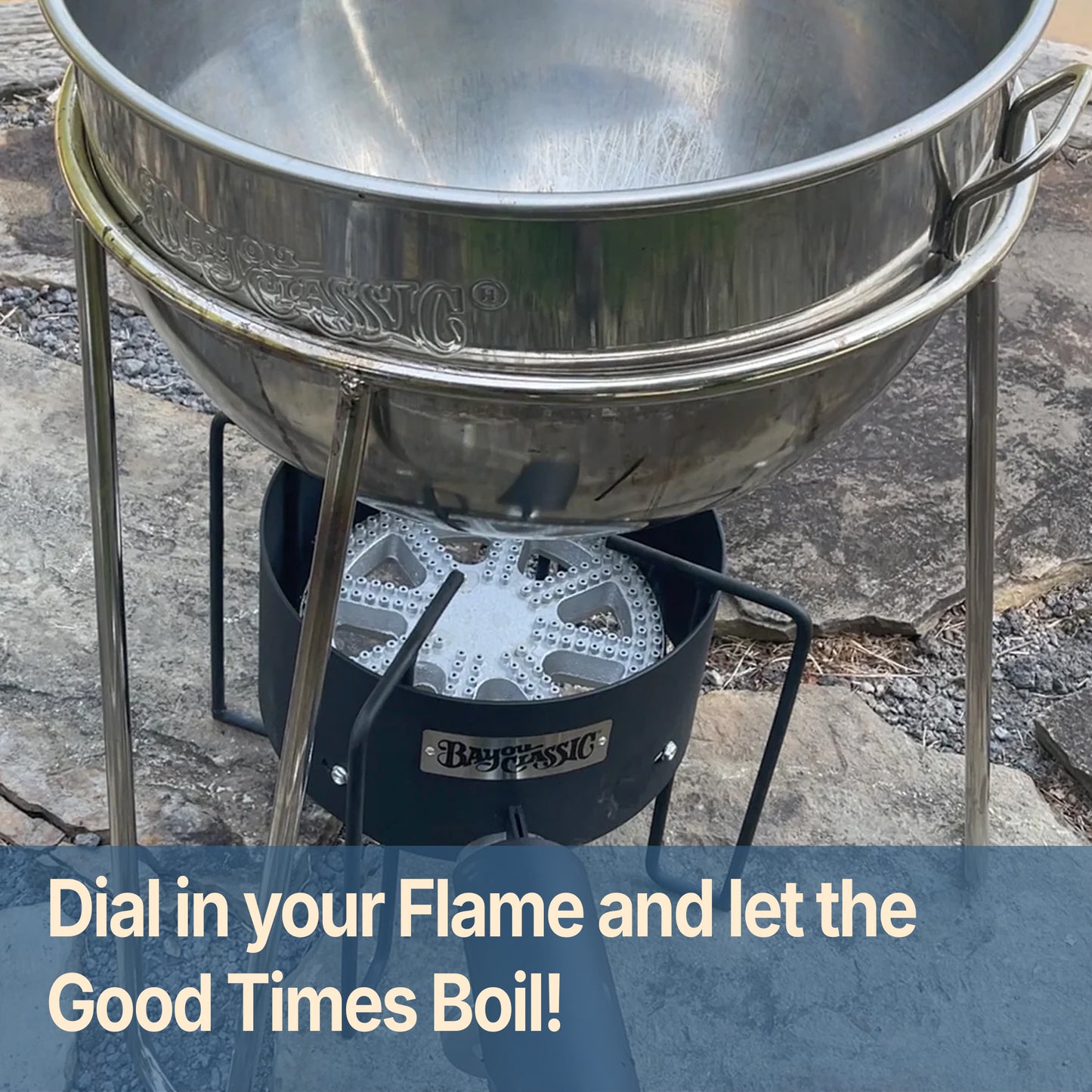 Stainless Kettle with stand over an outdoor banjo cooker and text that reads dial in your flame and let the good times boil