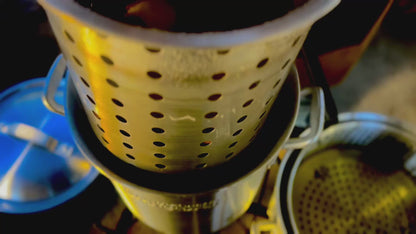 Video lowering basket into pot on a cooker