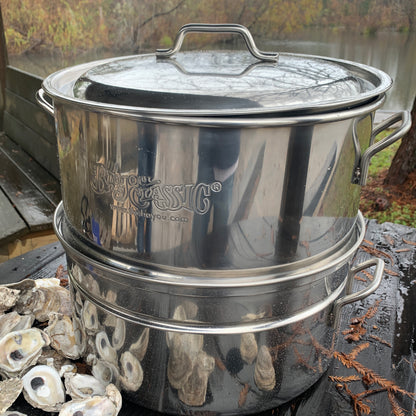 Stainless oyster steamer outside by a body of water