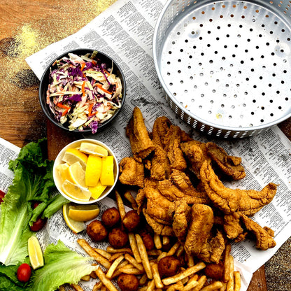 Image of fried fish, hushpuppies and french fries next to a perforated fry basket